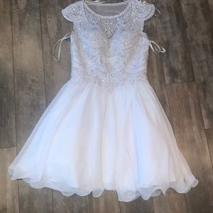 A dress only worn once for a wedding.